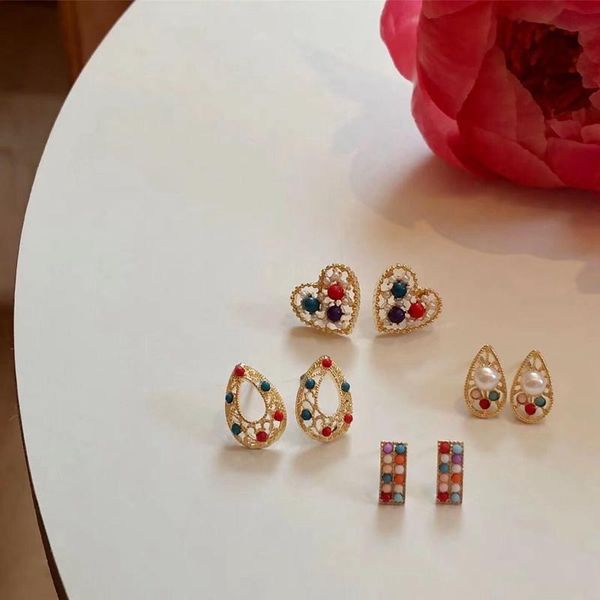 vintage colorful beads heart oval cute stud earrings for women fashion temperament gold color brinco jewelry, Golden;silver
vintage colorful beads heart oval cute stud earrings for women fashion temperament gold color brinco jewelry, Golden;silver