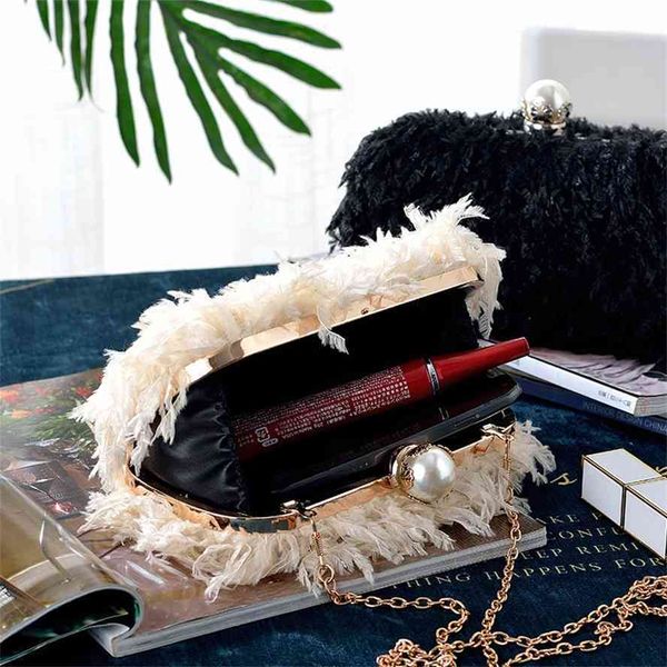 new pearl feather portable chain single shoulder banquet dress cheongsam hand fashion women's bag
new pearl feather portable chain single shoulder banquet dress cheongsam hand fashion women's bag