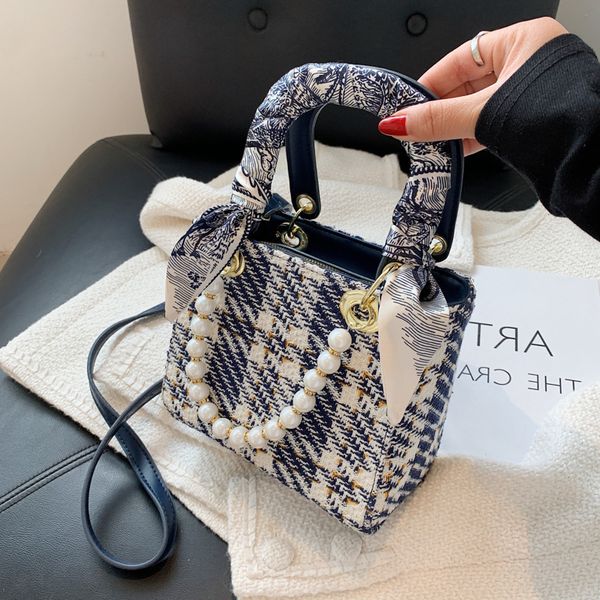 women 2021 summer new fashion woolen plaid portable princess bag women's net red texture pearl diagonal
women 2021 summer new fashion woolen plaid portable princess bag women's net red texture pearl diagonal