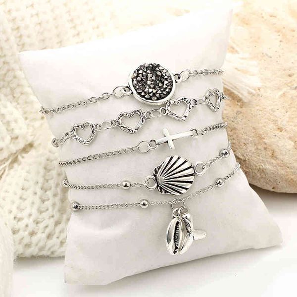 girls party jewelry beach wind shell cross hollow love conch fishtail ball bracelet five-piece fashion, Golden;silver
girls party jewelry beach wind shell cross hollow love conch fishtail ball bracelet five-piece fashion, Golden;silver