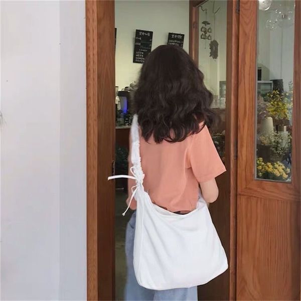 2021 summer thick strap drawstring canvas simple solid color large capacity single shoulder messenger bag female
2021 summer thick strap drawstring canvas simple solid color large capacity single shoulder messenger bag female