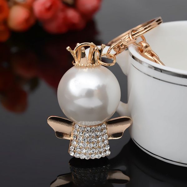 2021 fashion keychain new pearl alloy car key ring inlaid with diamond three dimensional angel gift bag pendant, Silver
2021 fashion keychain new pearl alloy car key ring inlaid with diamond three dimensional angel gift bag pendant, Silver