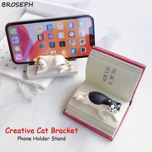 ins creative cute cartoon cat book computer phone holder resin crafts ornaments stand gift for friend girlfriend family cell mounts & holder
ins creative cute cartoon cat book computer phone holder resin crafts ornaments stand gift for friend girlfriend family cell mounts & holder