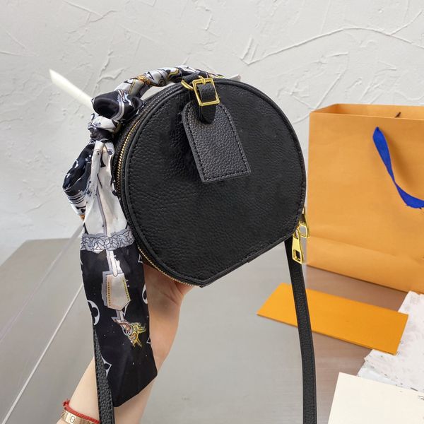 ladies fashion classic round cake ladies handbag solid color embossed geometric chain bow shoulder embroidery bag
ladies fashion classic round cake ladies handbag solid color embossed geometric chain bow shoulder embroidery bag