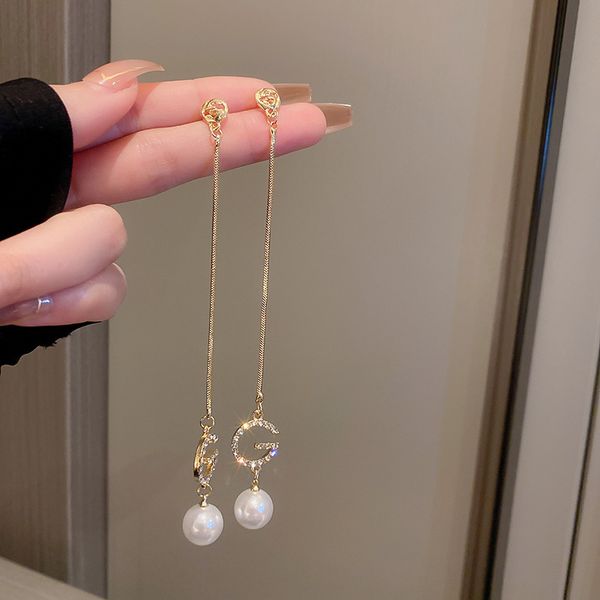 silver needle pearl diamond letters earrings korean simple and long tassel ear stud earring high-grade light luxury earrings for women, Golden
silver needle pearl diamond letters earrings korean simple and long tassel ear stud earring high-grade light luxury earrings for women, Golden