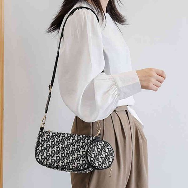 new canvas sling one shoulder messenger bag letter handbag two-piece set armpit bag women's bag
new canvas sling one shoulder messenger bag letter handbag two-piece set armpit bag women's bag