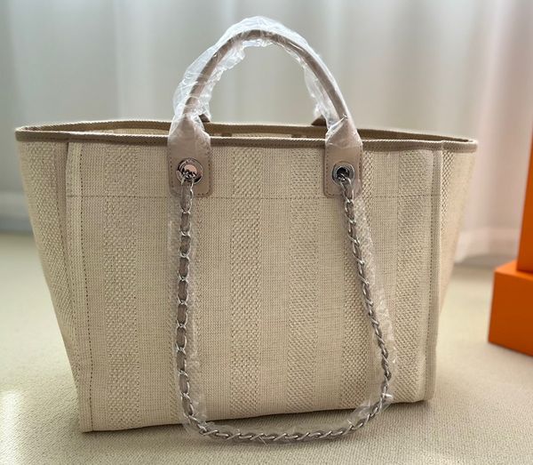 2022 latest style exquisite embroidered beach bag large capacity leather design handle handbag chain shoulder bag designer bags
2022 latest style exquisite embroidered beach bag large capacity leather design handle handbag chain shoulder bag designer bags