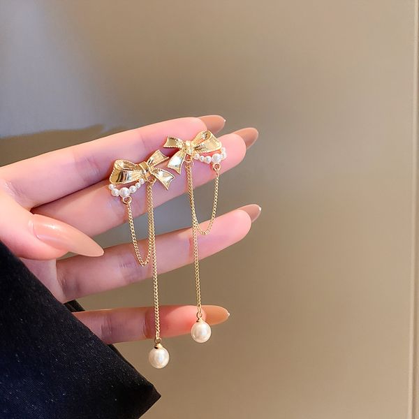 925 silver needle pearl bowknot tassel earrings korean sweet temperamental earrings indie design fashion eardrop, Golden
925 silver needle pearl bowknot tassel earrings korean sweet temperamental earrings indie design fashion eardrop, Golden