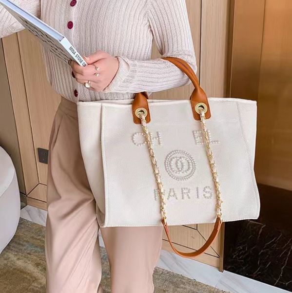 classic luxury fashion beach bags tote label pearl evening bag portable large capacity female designer canvas handbag brand women handbags l
classic luxury fashion beach bags tote label pearl evening bag portable large capacity female designer canvas handbag brand women handbags l
