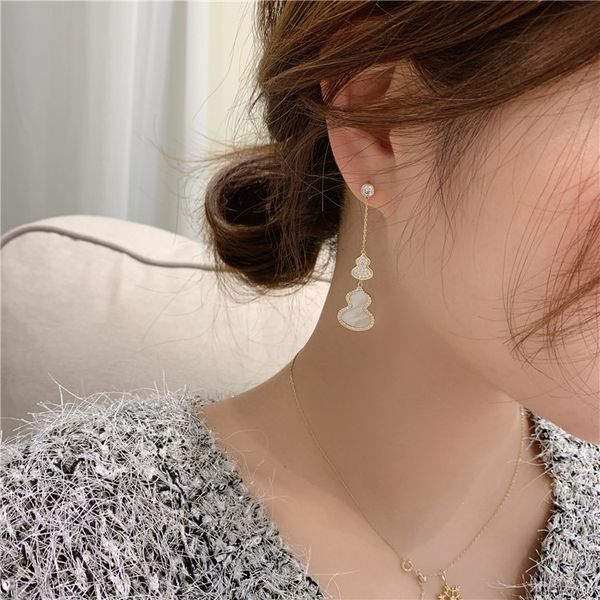 925 silver needle european and american diamond personalized gourd earrings korean long elegant stud earrings online red fashion eardrop ear, Golden
925 silver needle european and american diamond personalized gourd earrings korean long elegant stud earrings online red fashion eardrop ear, Golden