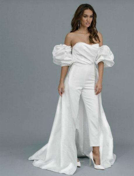 elegant bridal gowns wedding jumpsuits with detachable train white satin puff sleeve off shoulder strapless country beach wedding dress 2022
elegant bridal gowns wedding jumpsuits with detachable train white satin puff sleeve off shoulder strapless country beach wedding dress 2022