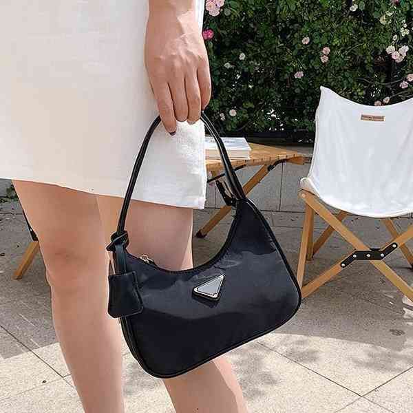 new triangle hobo armpit bag three in one waterproof nylon cloth vintge stick bag handbag
new triangle hobo armpit bag three in one waterproof nylon cloth vintge stick bag handbag