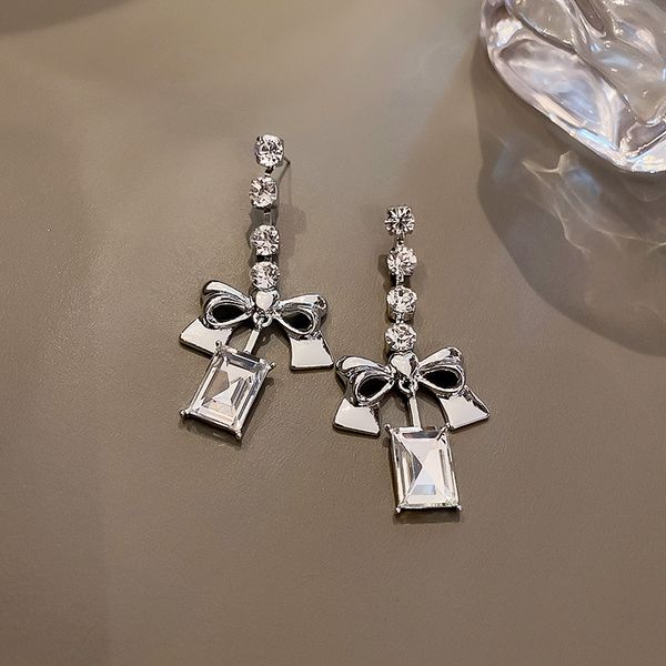 925 silver needle european and american exaggerated new personalized diamond bow earrings long earrings selling temperament eardrop, Golden
925 silver needle european and american exaggerated new personalized diamond bow earrings long earrings selling temperament eardrop, Golden