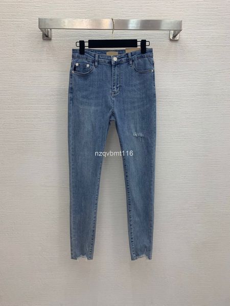 women's jeans european made leather brand on back of raw hem pants is decorated with fashionable holes, high elastic hips and small leg, Blue
women's jeans european made leather brand on back of raw hem pants is decorated with fashionable holes, high elastic hips and small leg, Blue
