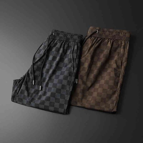 men's clothing brand summer 2022 new casual shorts korean youth fashion beach pants, White;black
men's clothing brand summer 2022 new casual shorts korean youth fashion beach pants, White;black