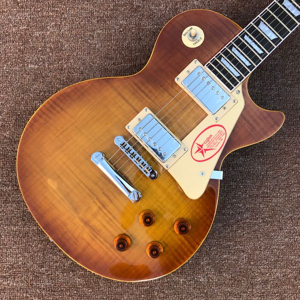 rosewood fingerboard electric guitar, chrome hardware, tobacco burst flame maple tune-o-matic bridge, frets binding, solid mahogany body gu
rosewood fingerboard electric guitar, chrome hardware, tobacco burst flame maple tune-o-matic bridge, frets binding, solid mahogany body gu