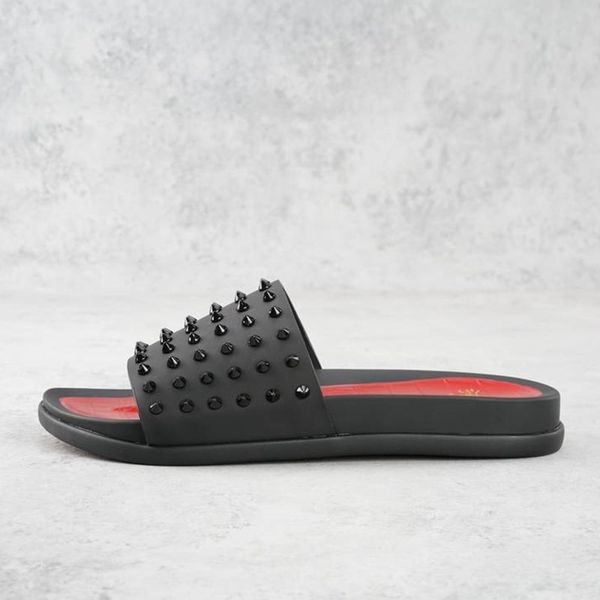 fashionable high-end custom men outside wearing slippers beach black and red real leather uppers with printed rivet design trim 
fashionable high-end custom men outside wearing slippers beach black and red real leather uppers with printed rivet design trim