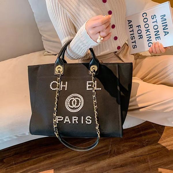 luxury classic designer beach bags tote label pearl evening bag portable large capacity female fashion canvas handbag brand ch women handbag
luxury classic designer beach bags tote label pearl evening bag portable large capacity female fashion canvas handbag brand ch women handbag
