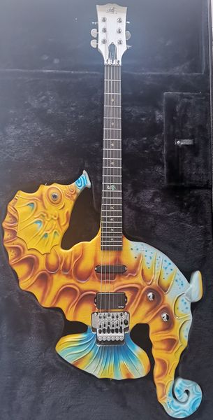 hand carved six string electric guitar with seahorse pattern. our shop can customize all kinds of guitars
hand carved six string electric guitar with seahorse pattern. our shop can customize all kinds of guitars