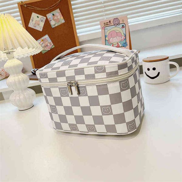 ins cosmetic bag women's portable simple large capacity advanced feeling new travel oversized wash lattice storage 220518
ins cosmetic bag women's portable simple large capacity advanced feeling new travel oversized wash lattice storage 220518