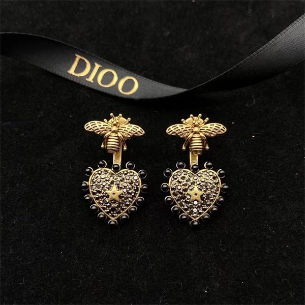 ornament charm earring golden full diamond love star earrings wasp black pearl edge earrings
ornament charm earring golden full diamond love star earrings wasp black pearl edge earrings