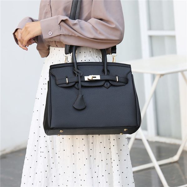 designer bags new trendy european and american simple solid color shoulder bag fashion tassel handbag 31cm
designer bags new trendy european and american simple solid color shoulder bag fashion tassel handbag 31cm