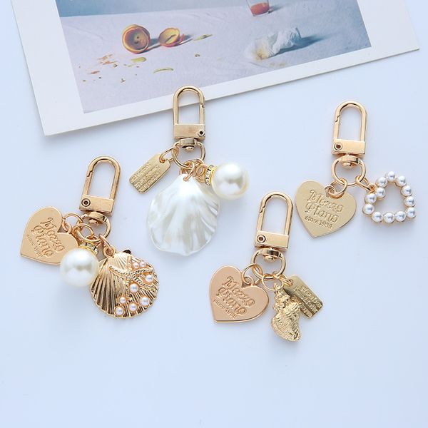 lovely cute pearl shell conch keychains women zinc alloy love keychain pendant car keyring backpack key chain lady fashion jewelry accessori, Silver
lovely cute pearl shell conch keychains women zinc alloy love keychain pendant car keyring backpack key chain lady fashion jewelry accessori, Silver