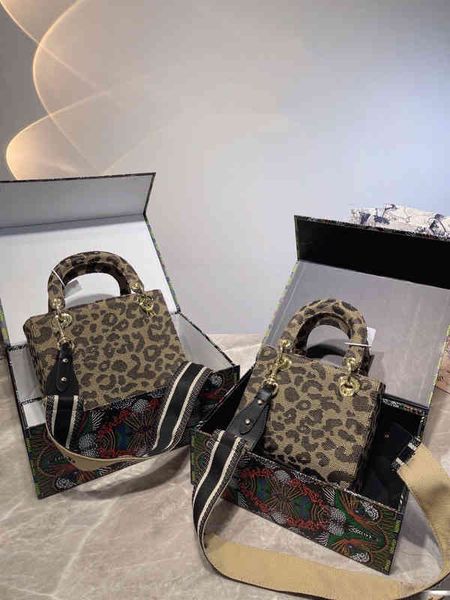 women luxurys designers fashion leopard-print canvas wide straps bags mini tote women handbag shoulder designer crossbody female purses 2203
women luxurys designers fashion leopard-print canvas wide straps bags mini tote women handbag shoulder designer crossbody female purses 2203