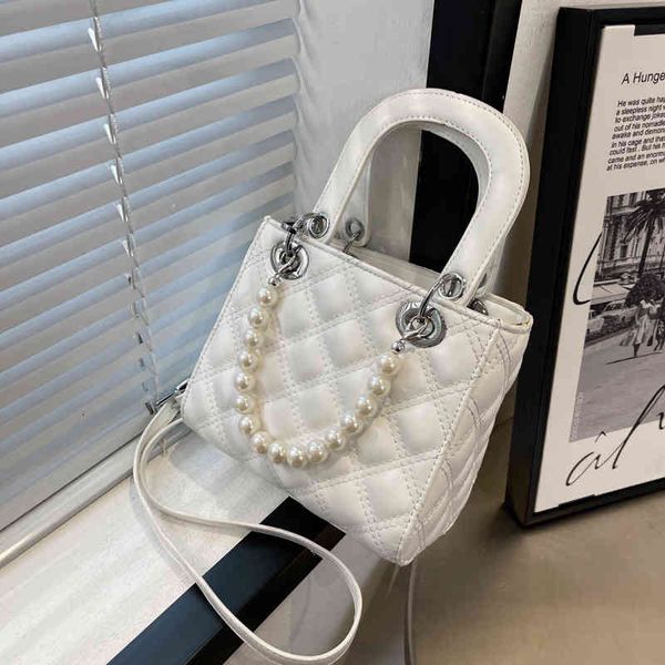 bag 2022 new fashion pearl handbag single shoulder messenger wholesale western style ladies designer bags
bag 2022 new fashion pearl handbag single shoulder messenger wholesale western style ladies designer bags