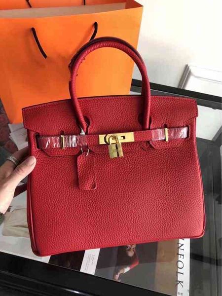 women herme winter luxurys lock handbags leisure inner patch wine red litchi pattern horizontal square hard handle solid color 
women herme winter luxurys lock handbags leisure inner patch wine red litchi pattern horizontal square hard handle solid color