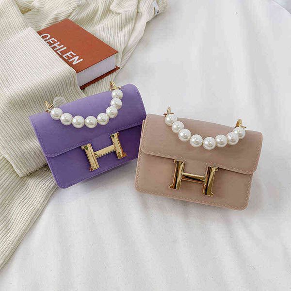 higheast quality women bags 2022 new button pvc fashion shoulder pearl small bag female single handbags
higheast quality women bags 2022 new button pvc fashion shoulder pearl small bag female single handbags