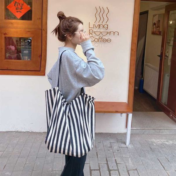 striped shoulder bag lazy wind large capacity canvas out of the street fashion simple women's shopping
striped shoulder bag lazy wind large capacity canvas out of the street fashion simple women's shopping