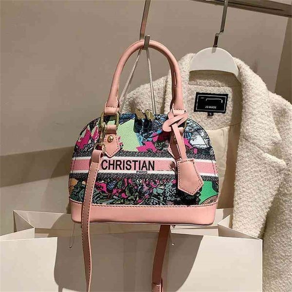 women's shell hand single messenger color painting graffiti printing foreign trade cross-border bags purses outlet online
women's shell hand single messenger color painting graffiti printing foreign trade cross-border bags purses outlet online