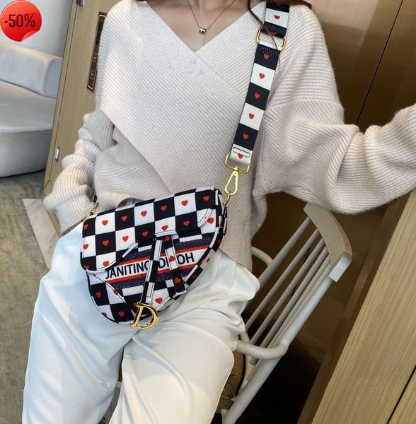 the factory directly new star net red same single shoulder oblique horshoe semi-circular d-shaped home women's bag tide
the factory directly new star net red same single shoulder oblique horshoe semi-circular d-shaped home women's bag tide
