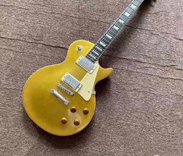 factory customized electric guitar mahogany body gold fast delivery
factory customized electric guitar mahogany body gold fast delivery