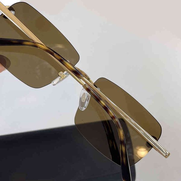 2022 new fashion designer polarized sunglasses six color lens frameless sun glasses classic vintage sunshades for men and women, White;black
2022 new fashion designer polarized sunglasses six color lens frameless sun glasses classic vintage sunshades for men and women, White;black