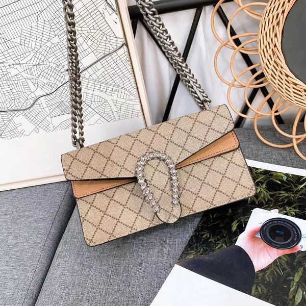 2022 ss designer women bag fashion handbags two-tone genuine leather classic retro all-match tiger head bacchus chain casual clutch bags mes
2022 ss designer women bag fashion handbags two-tone genuine leather classic retro all-match tiger head bacchus chain casual clutch bags mes