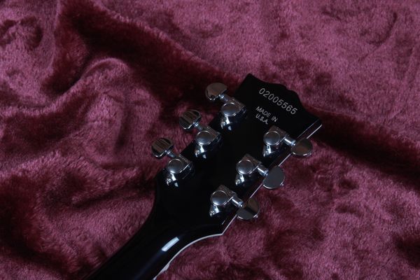black lp custom classical 1960s version guitar sliver hardware chinese factory product
black lp custom classical 1960s version guitar sliver hardware chinese factory product