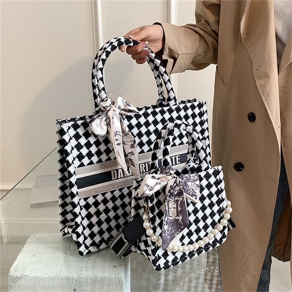 checkered thousand checkered women's armpit portable small square tote autumn and winter fashion 80% off purse sales
checkered thousand checkered women's armpit portable small square tote autumn and winter fashion 80% off purse sales