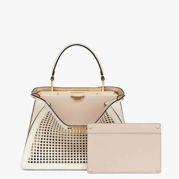 hollowed out sunlight totes bag ladies handbag large capacity silver tote latest handbags quality hardware buckle amber handle fashion lette
hollowed out sunlight totes bag ladies handbag large capacity silver tote latest handbags quality hardware buckle amber handle fashion lette