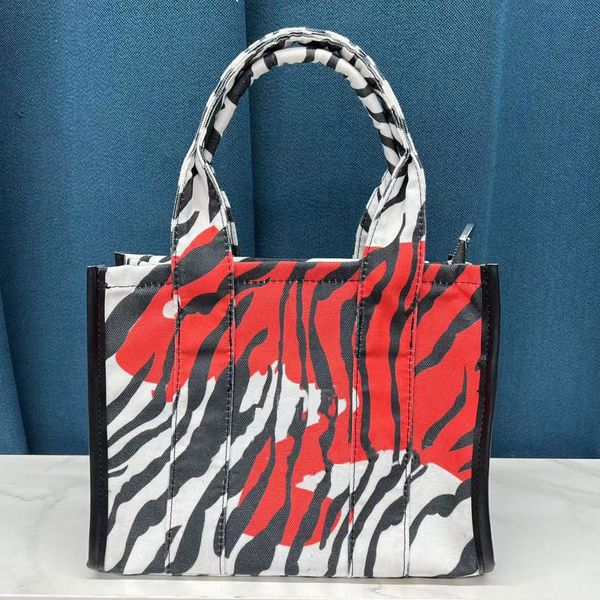 designer luxury women the tote bag fashion versatile handbags shoulder crossbody bags purse tories totes large capacity saddle wallets 7a m9
designer luxury women the tote bag fashion versatile handbags shoulder crossbody bags purse tories totes large capacity saddle wallets 7a m9
