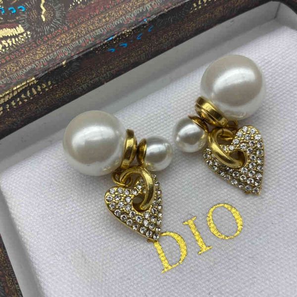 women's fashion personality trend new brand earrings wholesale dijia love pearl are simple and peach heart diamond studded, Silver
women's fashion personality trend new brand earrings wholesale dijia love pearl are simple and peach heart diamond studded, Silver