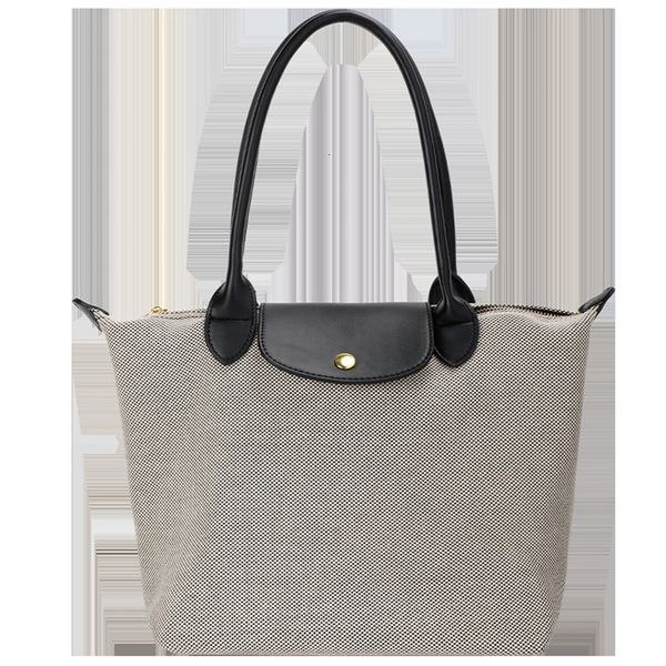 longxiang bag autumn new canvas dumpling large capacity portable tote bag fashion trendy
longxiang bag autumn new canvas dumpling large capacity portable tote bag fashion trendy