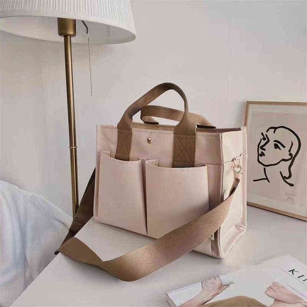 designers handbags korean mommy bag multi compartment practical outdoor portable shoulder large capacity mother baby ins versatile shopping
designers handbags korean mommy bag multi compartment practical outdoor portable shoulder large capacity mother baby ins versatile shopping
