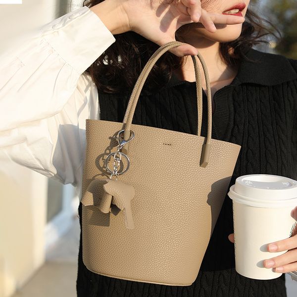 luxury togo leather bucket bag small design light luxury ladies shoulder bag leather handbag with elephant ornament
luxury togo leather bucket bag small design light luxury ladies shoulder bag leather handbag with elephant ornament