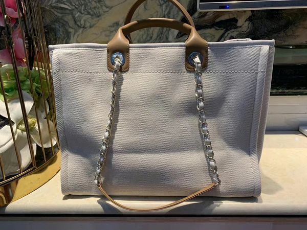 2022 wholesale large capacity female beach bags canvas material womens shopping bag purse thick suitable for everyday vacation shoulder bags
2022 wholesale large capacity female beach bags canvas material womens shopping bag purse thick suitable for everyday vacation shoulder bags