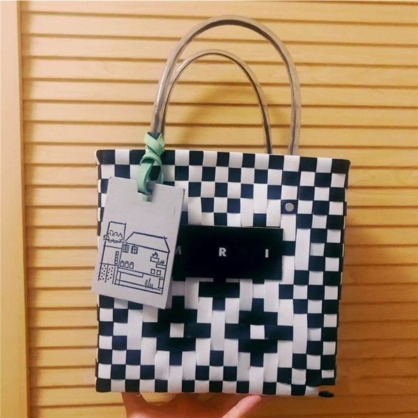 fashion light luxury handbag designer ms. marn handmade woven basket bag
fashion light luxury handbag designer ms. marn handmade woven basket bag