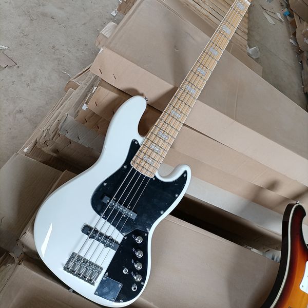 5 strings white electric bass guitar with black pickguard rosewood fretboard
5 strings white electric bass guitar with black pickguard rosewood fretboard