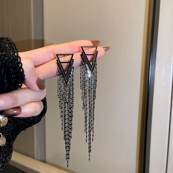 silver needle triangle diamond-studded tassel earrings european and american fashion high-profile earrings temperament entry lux high sense, Golden
silver needle triangle diamond-studded tassel earrings european and american fashion high-profile earrings temperament entry lux high sense, Golden