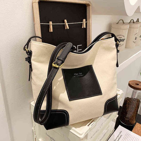 women's bag fashion canvas single shoulder messenger bag large capacity versatile tote portable school bag 220510
women's bag fashion canvas single shoulder messenger bag large capacity versatile tote portable school bag 220510